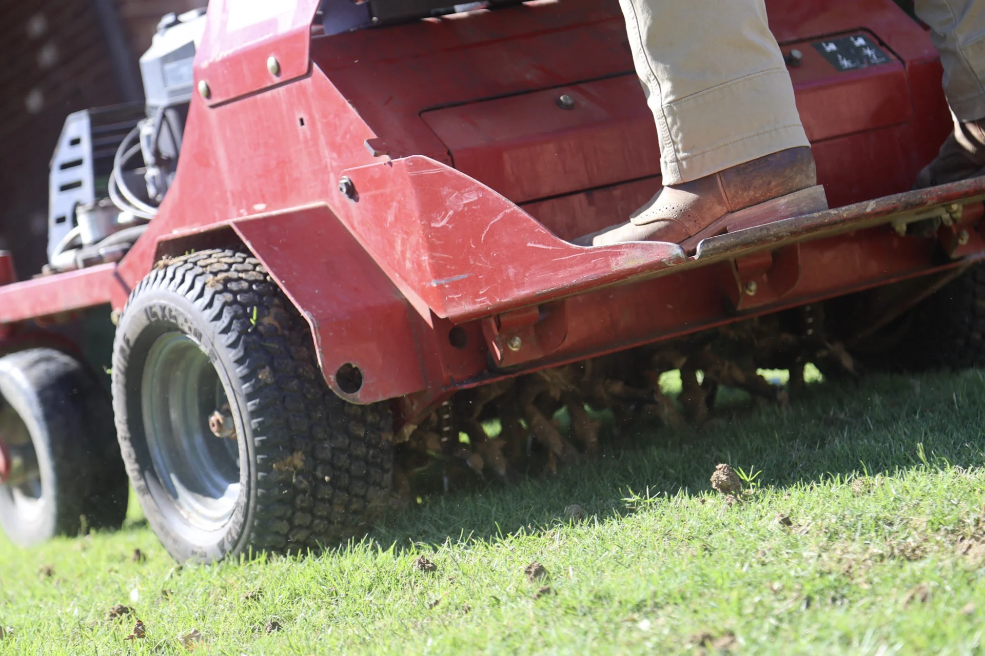 Lawn Aerifier Pulling Plugs on Memphis lawn ahead of fall overseeding season